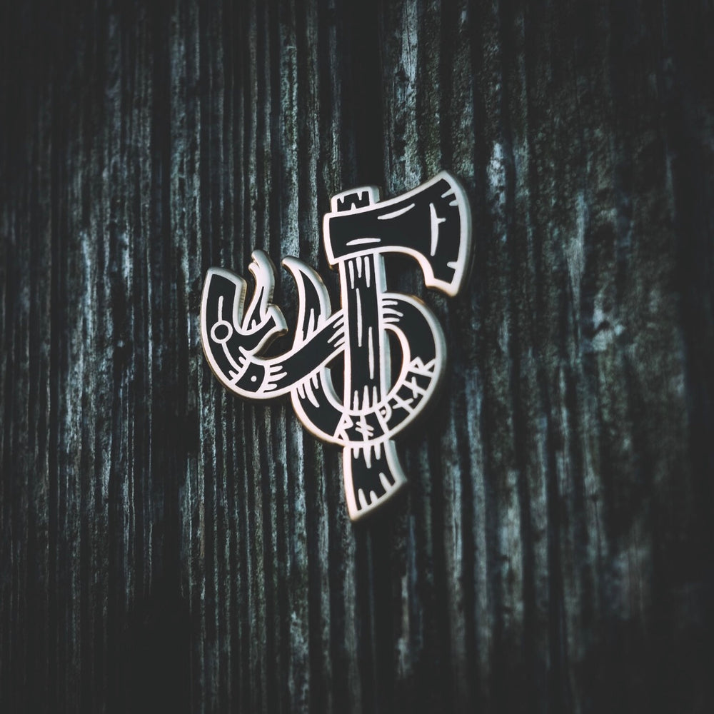 
                
                    Load image into Gallery viewer, Ragnar axe and snake enamel pin designed by Badger King Tattoo for Northern Fire Designs
                
            