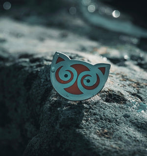 
                
                    Load image into Gallery viewer, Snowdon Cat enamal pin designed by Sacred Knot Tattoo. Inspired by an artefact found in Snowdonia national park in Wales (Cymru)
                
            