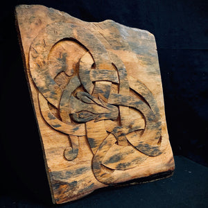 hand carved viking snake on wood jormungandr