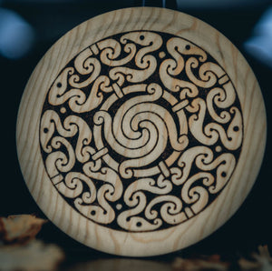 Villkat Arts, pyrography, Celtic art, Northern Fire, celtic artist, wooden plate, sun wheel, celtic sunwheel
