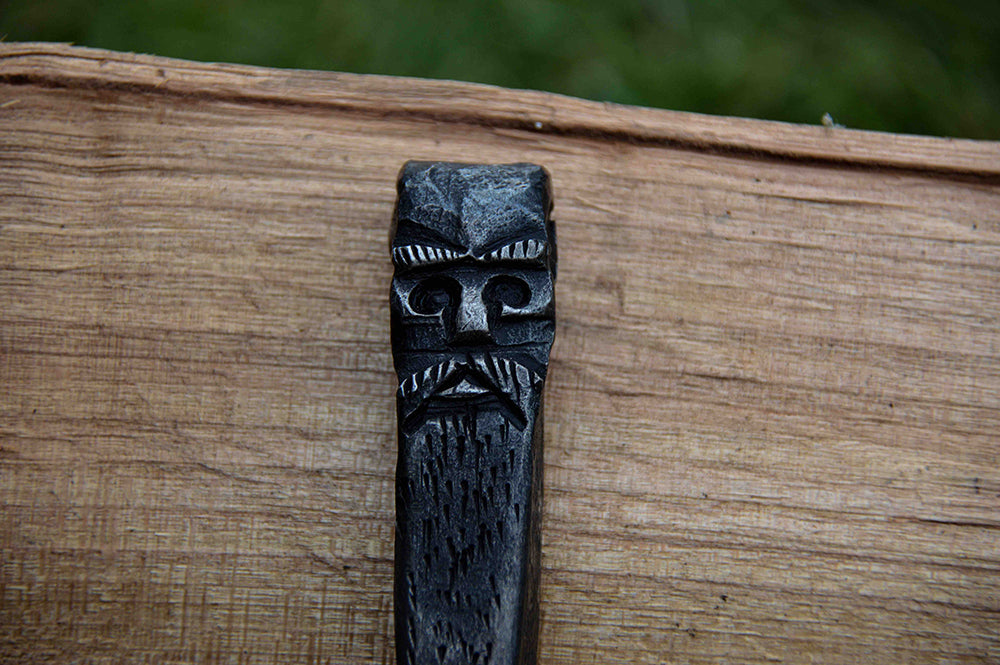 Hand forged Odin bottle opener by oak tree forge